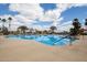 Inviting community pool with surrounding lounge chairs at 16884 W Pinchot Ave, Goodyear, AZ 85395