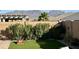 Landscaped backyard featuring mountain views at 18401 W Long Lake Rd, Goodyear, AZ 85338