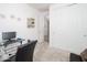 Spacious home office with built-in closet and plenty of light at 18406 W Sunbelt Dr, Surprise, AZ 85374