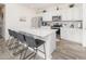 Modern kitchen with granite countertops and stainless steel appliances at 18406 W Sunbelt Dr, Surprise, AZ 85374
