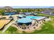 Community pool, playground and gazebo with scenic views at 29864 N Desert Willow Blvd, San Tan Valley, AZ 85143