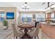 Kitchen nook with a round table and four chairs at 29864 N Desert Willow Blvd, San Tan Valley, AZ 85143