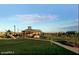 Community playground with a gazebo and grassy area at 29864 N Desert Willow Blvd, San Tan Valley, AZ 85143