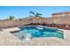 Inviting kidney-shaped pool with waterfall feature at 29864 N Desert Willow Blvd, San Tan Valley, AZ 85143
