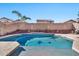 Refreshing blue swimming pool with decorative tile accents at 29864 N Desert Willow Blvd, San Tan Valley, AZ 85143