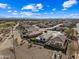 Aerial view of a residential neighborhood with golf course views at 319 S 227Th Ct, Buckeye, AZ 85326