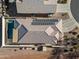 Aerial view of house with solar panels and pool at 319 S 227Th Ct, Buckeye, AZ 85326