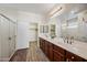 Elegant bathroom with double vanity and walk-in shower at 319 S 227Th Ct, Buckeye, AZ 85326