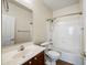 Bathroom with tub, shower, and wood vanity at 319 S 227Th Ct, Buckeye, AZ 85326