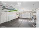 Spacious garage with overhead storage and room for two cars at 319 S 227Th Ct, Buckeye, AZ 85326