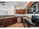 Modern kitchen with stainless steel appliances and granite countertops at 319 S 227Th Ct, Buckeye, AZ 85326