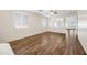 Open living room featuring hardwood floors and neutral colors at 319 S 227Th Ct, Buckeye, AZ 85326