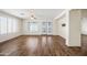 Living room with hardwood floors and french doors at 319 S 227Th Ct, Buckeye, AZ 85326