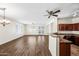 Spacious living room with hardwood floors and neutral walls at 319 S 227Th Ct, Buckeye, AZ 85326