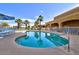 Inviting community pool featuring comfortable lounge chairs and a refreshing blue hue at 319 S 227Th Ct, Buckeye, AZ 85326