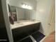 Elegant bathroom with double sinks and marble countertops at 3233 W Pleasant S Ln, Phoenix, AZ 85041