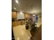 Large kitchen with granite island and ample cabinetry at 3233 W Pleasant S Ln, Phoenix, AZ 85041