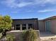 Back patio featuring a concrete floor, a pergola, and views of mature landscaping at 3301 S Goldfield Rd # 3038, Apache Junction, AZ 85119