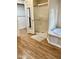 Clean bathroom with a walk-in shower, soaking tub, and a mirrored door at 3301 S Goldfield Rd # 3038, Apache Junction, AZ 85119