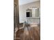 Bathroom featuring a walk-in shower, soaking tub, and double sink vanity at 3301 S Goldfield Rd # 3038, Apache Junction, AZ 85119