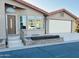 Charming single-story home featuring a two-car garage and a red tile roof at 3301 S Goldfield Rd # 3038, Apache Junction, AZ 85119