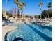 Sparkling community pool with lounge chairs, ideal for relaxation and enjoying sunny days at 3301 S Goldfield Rd # 3038, Apache Junction, AZ 85119
