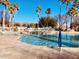 Sparkling community pool with lounge chairs, ideal for relaxation and enjoying sunny days at 3301 S Goldfield Rd # 3038, Apache Junction, AZ 85119