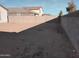 Large backyard with block wall at 36061 W Santa Clara Ave, Maricopa, AZ 85138