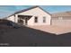 House exterior and unlandscaped yard at 36061 W Santa Clara Ave, Maricopa, AZ 85138