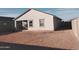 House exterior and unlandscaped yard at 36061 W Santa Clara Ave, Maricopa, AZ 85138