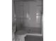 Bathroom with a large shower and built-in shelving at 36061 W Santa Clara Ave, Maricopa, AZ 85138