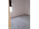 Well-lit bedroom featuring grey carpet and ample space at 36061 W Santa Clara Ave, Maricopa, AZ 85138