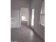 View of bedroom and bathroom from hallway at 36061 W Santa Clara Ave, Maricopa, AZ 85138