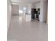 Open concept kitchen with island and stainless steel appliances at 36061 W Santa Clara Ave, Maricopa, AZ 85138