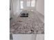 Kitchen island with granite countertops and double sinks at 36061 W Santa Clara Ave, Maricopa, AZ 85138