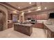 Gourmet kitchen with granite countertops and stainless steel appliances at 37103 N Boulder View Dr, Scottsdale, AZ 85262