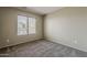 Neutral bedroom with a large window offering natural light and a calm atmosphere at 4275 E Amarillo Dr, San Tan Valley, AZ 85140