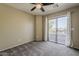 Inviting bedroom featuring a ceiling fan and access to a private balcony with outdoor views at 4275 E Amarillo Dr, San Tan Valley, AZ 85140