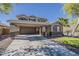 Inviting two-story home featuring desert landscaping, a two car garage, and covered parking at 4275 E Amarillo Dr, San Tan Valley, AZ 85140