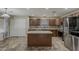 Well-equipped kitchen featuring an island, stainless steel appliances, and lots of cabinet space at 4275 E Amarillo Dr, San Tan Valley, AZ 85140