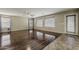 Open-concept living space featuring beautiful wood floors and backyard access at 4275 E Amarillo Dr, San Tan Valley, AZ 85140