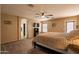 Main bedroom with ceiling fan and ensuite bathroom at 4275 E Amarillo Dr, San Tan Valley, AZ 85140