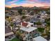 Luxury home with pool and expansive backyard, mountain views at sunset at 5012 E Blanche Dr, Scottsdale, AZ 85254