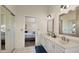 Double vanity bathroom with bedroom access at 5012 E Blanche Dr, Scottsdale, AZ 85254