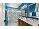 Double vanity bathroom with blue walls at 5012 E Blanche Dr, Scottsdale, AZ 85254