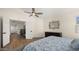 Bright bedroom with wood floors and ceiling fan at 5012 E Blanche Dr, Scottsdale, AZ 85254