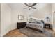 Spacious bedroom with wood floors and ceiling fan at 5012 E Blanche Dr, Scottsdale, AZ 85254