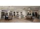 Open dining area with a pool table and views into the kitchen at 5012 E Blanche Dr, Scottsdale, AZ 85254