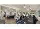 Bright dining room with large windows and seating for eight at 5012 E Blanche Dr, Scottsdale, AZ 85254