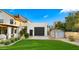 Detached garage with additional storage space and a grassy lawn at 5012 E Blanche Dr, Scottsdale, AZ 85254